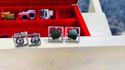 JEWELRY BOX PACKED WITH VINTAGE CUFFLINKS, 2 POCKET KNIVES AND A COORS ASHTRAY