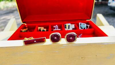 JEWELRY BOX PACKED WITH VINTAGE CUFFLINKS, 2 POCKET KNIVES AND A COORS ASHTRAY