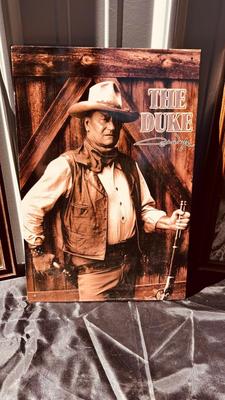 JOHN WAYNE FRAMED PHOTOGRAPHS AND TIN PHOTO SIGN