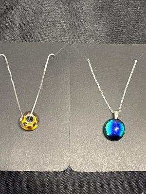 Two sterling necklaces with pendants