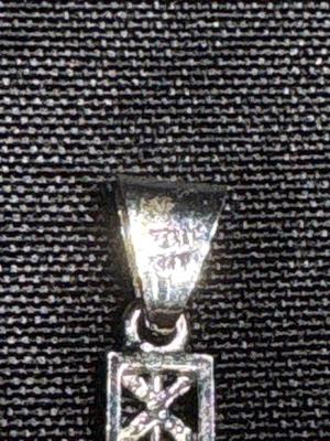 Silver cross pendant