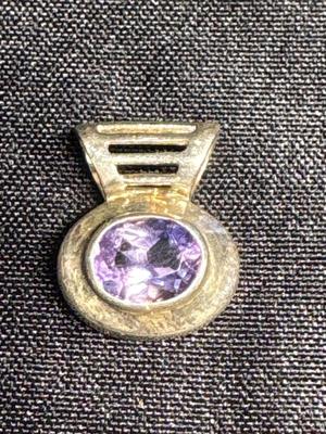 Sterling pendant with purple stone