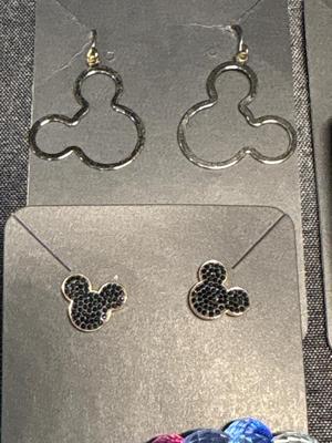 Mickey Mouse earrings, pin, and bracelet