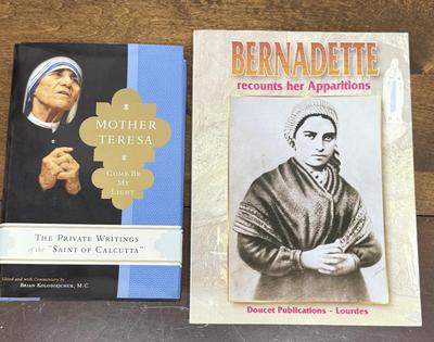 Sale Photo Thumbnail #70: Paperback Bernadette Recounts Her Apparitions by Antonio Bernardo and Hardback Mother Teresa: Come Be My Light - The Private Writings of the Saint of Calcutta. Both in good condition.