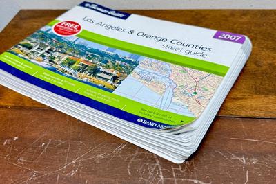 Sale Photo Thumbnail #121: Includes Orange County 1991 and 1998, and Los Angeles and Orange County 1987 and 2007. In fair to good condition, with some bent page edges.