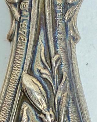 Sale Photo Thumbnail #149: Intricate Design is marked Sterling and L378 in the pattern. In very good condition considering age. There is a faint monogram. Wood is very light and the total weight is 140.0g
