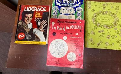 Sale Photo Thumbnail #171: Titles include: Dave Coleman's The Pick of the polkas, Liberace's Big Note Song Book, Family Songbook, and Everybody's Favorite Songs. Good to fir condition.