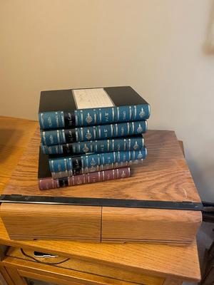 VHS tapes, holder, and book-like cases