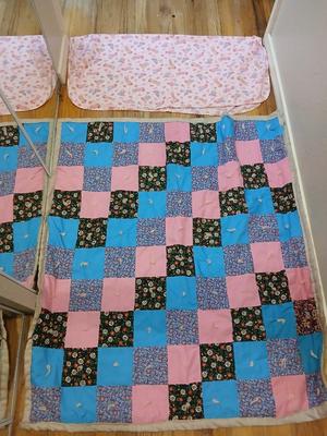 Handmade baby quilt with vintage baby blanket with stitched edging