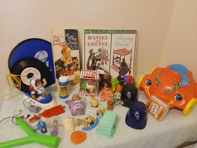 Grandkid's toybox - includes 1969 Mattel baby go bye bye bumpity car records, dolls, bubbles, and a great selection of new and...