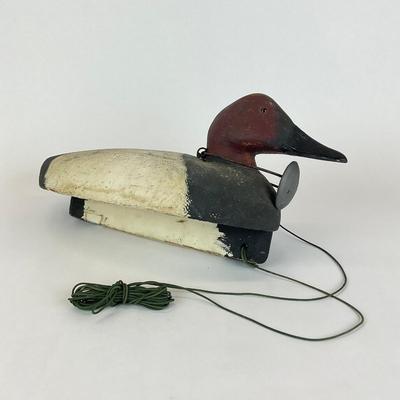 Sale Photo Thumbnail #1013: Working decoy duck circa 1975
Has lead weight around neck
Signed By James Portz
Measures: 17" long x 8" high x 8" wide