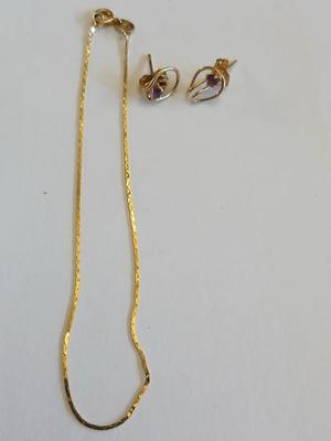 14 Kt marked bracelet with Amythyst 14 KT marked earrings