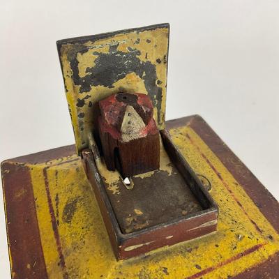 Sale Photo Thumbnail #1031: Designed By John Hall, patent 1869
Lady is missing head
Measures: 4" x 4" x 5" high