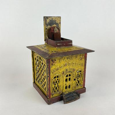 Sale Photo Thumbnail #1032: Designed By John Hall, patent 1869
Lady is missing head
Measures: 4" x 4" x 5" high