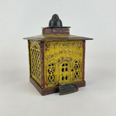 Sale Photo Thumbnail #1026: Designed By John Hall, patent 1869
Lady is missing head
Measures: 4" x 4" x 5" high