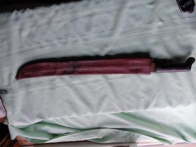 MACHETTI IN LEATHER SLEAVE