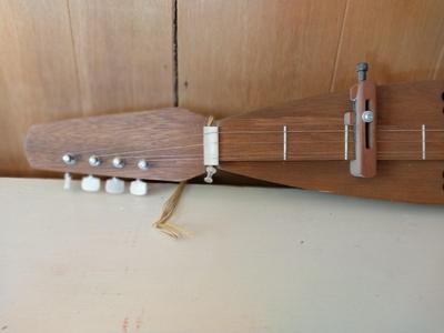 TWO WOODEN MUSICAL INSTRUMENTS
