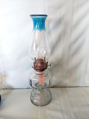 TWO VINTAGE GLASS OIL LAMPS