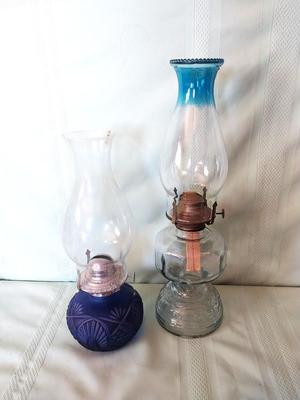 TWO VINTAGE GLASS OIL LAMPS