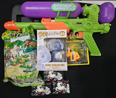 Sale Photo Thumbnail #82: Super Soaker, Lego, Disney, Funko Lot