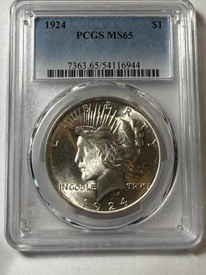 PCGS CERTIFIED 1924-P MS65 PEACE SILVER DOLLAR AS PICTURED.