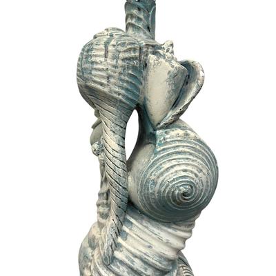 Sale Photo Thumbnail #179: Beach Shells Turquoise Heavy Tall Lamp; Testing/Working (no shade), very unique!
Is not made of concrete but some very heavy substance. 34" tall (entire height), 23" base height