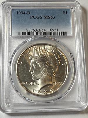 PCGS CERTIFIED 1934-D MS63 PEACE SILVER DOLLAR SEMI-KEY DATE AS PICTURED.