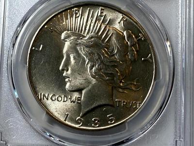 PCGS CERTIFIED 1935-P MS63 PEACE SILVER DOLLAR BETTER DATE AS PICTURED.
