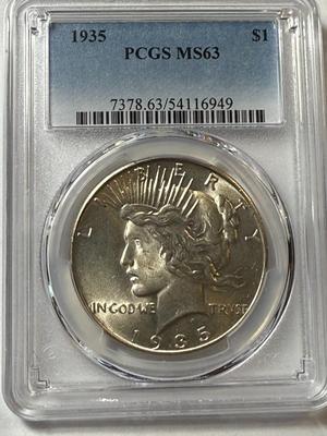 PCGS CERTIFIED 1935-P MS63 PEACE SILVER DOLLAR BETTER DATE AS PICTURED.