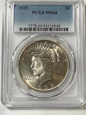 PCGS CERTIFIED 1935-P MS64 PEACE SILVER DOLLAR BETTER DATE AS PICTURED.