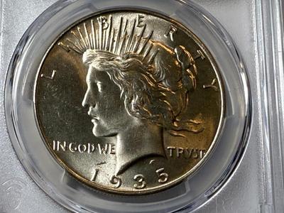 PCGS CERTIFIED 1935-P MS64 PEACE SILVER DOLLAR BETTER DATE AS PICTURED.