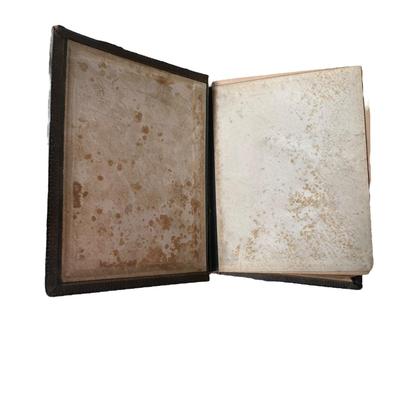 Sale Photo Thumbnail #255: Late 19th Century Family Bible 1882- not in good overall shape as you can see but very unique and historical. Very heavy, family record pages filled out. Pages inside are in good condition. Musty scent.