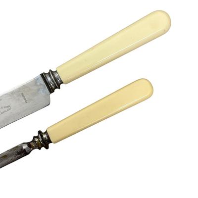 Sale Photo Thumbnail #271: Lot of Vintage Kitchenware-
Metal food mill with wooden handle, tin measuring cup , ice cream/food scoop, kitchen knife (Cooper Bros & Sons Ltd, Sheffiend England, and sharpener with cream handles, small ball jar lid