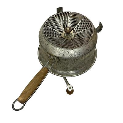 Sale Photo Thumbnail #267: Lot of Vintage Kitchenware-
Metal food mill with wooden handle, tin measuring cup , ice cream/food scoop, kitchen knife (Cooper Bros & Sons Ltd, Sheffiend England, and sharpener with cream handles, small ball jar lid