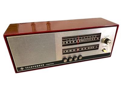 Sale Photo Thumbnail #278: Vintage Working Telefunken (West Germany) Caprice Transistor (Portable Solid-State) Radio, Mid Century Modern
Shows wear but works- tested and it plays both AM and FM; one knob missing