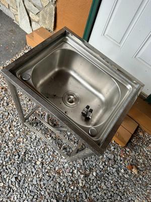 Sale Photo Thumbnail #293: Freestanding 304 Stainless Steel Utility Sink with Stand, Unused
Deep single basin; mounted on a sturdy tubular steel stand with shelf bar at the bottom. Comes with drain assembly and flixible P-trap hose. Never been installed. Great for garage, workshop,
