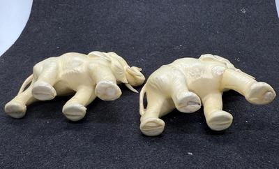 Sale Photo Thumbnail #481: One elephant has a repaired leg.