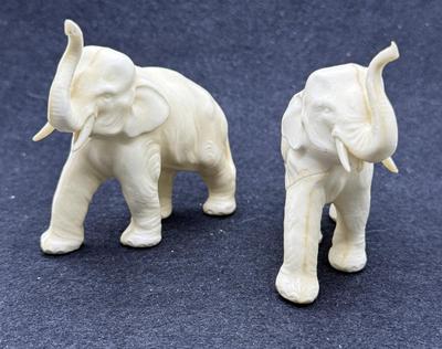 Sale Photo Thumbnail #483: One elephant has a repaired leg.