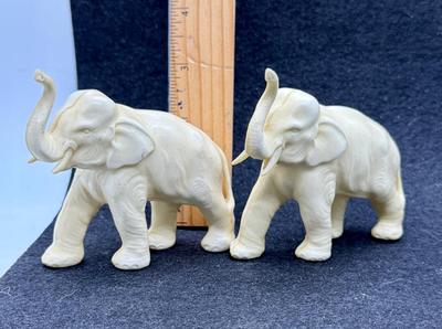 Sale Photo Thumbnail #480: One elephant has a repaired leg.