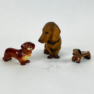 Sale Photo Thumbnail #1239: Two porcelain, middle is wood
Wooden: 3.5" high x 4" long