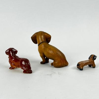 Sale Photo Thumbnail #1240: Two porcelain, middle is wood
Wooden: 3.5" high x 4" long