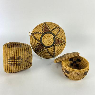 Sale Photo Thumbnail #1266: One basket has lid, other has large weaved coaster
Large basket: 5.75" high
Coaster: 7.75" diameter
Small basket: 4" high with lid