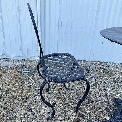 Sale Photo Thumbnail #1283: Has clawed feet, has small amount of rust
Table: 26.5" high x 23.5" diameter
Chairs: 31.5" high x 15.25" wide x 13.5" deep
