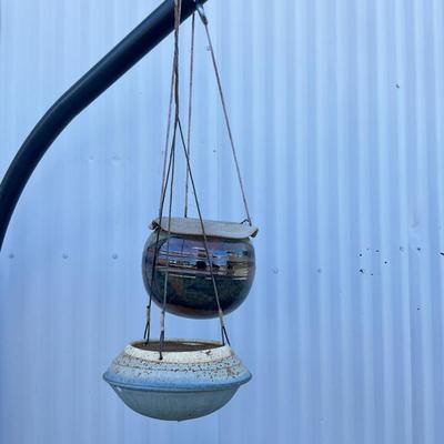 Sale Photo Thumbnail #1288: Three hanging pots, one missing string, one non hanging
Biggest pot: 8" high x 8.5" diameter