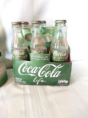 VINTAGE GREEN LABLE COKE BOTTLES AND GLASS OIL LAMP