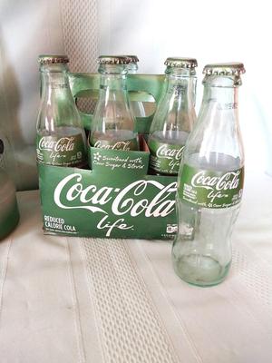 VINTAGE GREEN LABLE COKE BOTTLES AND GLASS OIL LAMP