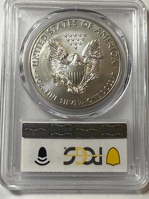 PCGS CERTIFIED 2013 MS68 HEAVILY TONED RIMS OBV. SILVER EAGLE DOLLAR AS PICTURED.