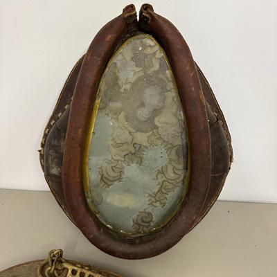Sale Photo Thumbnail #382: Vtg Horse Collar with mirror insert and Wooden Yoke/Hames with Chains and Rings Set- fair condition; common from mid 1800's to early 20th century. Both pieces show age, wear, and patina consistent with antique farm equipment.