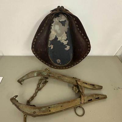 Sale Photo Thumbnail #380: Vtg Horse Collar with mirror insert and Wooden Yoke/Hames with Chains and Rings Set- fair condition; common from mid 1800's to early 20th century. Both pieces show age, wear, and patina consistent with antique farm equipment.