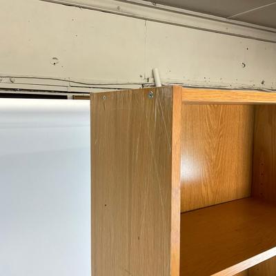 Sale Photo Thumbnail #1306: Has some scratches on side of shelf. Adjustable peg shelves
Measures: 6'7" high x 23.5" wide x 11" deep